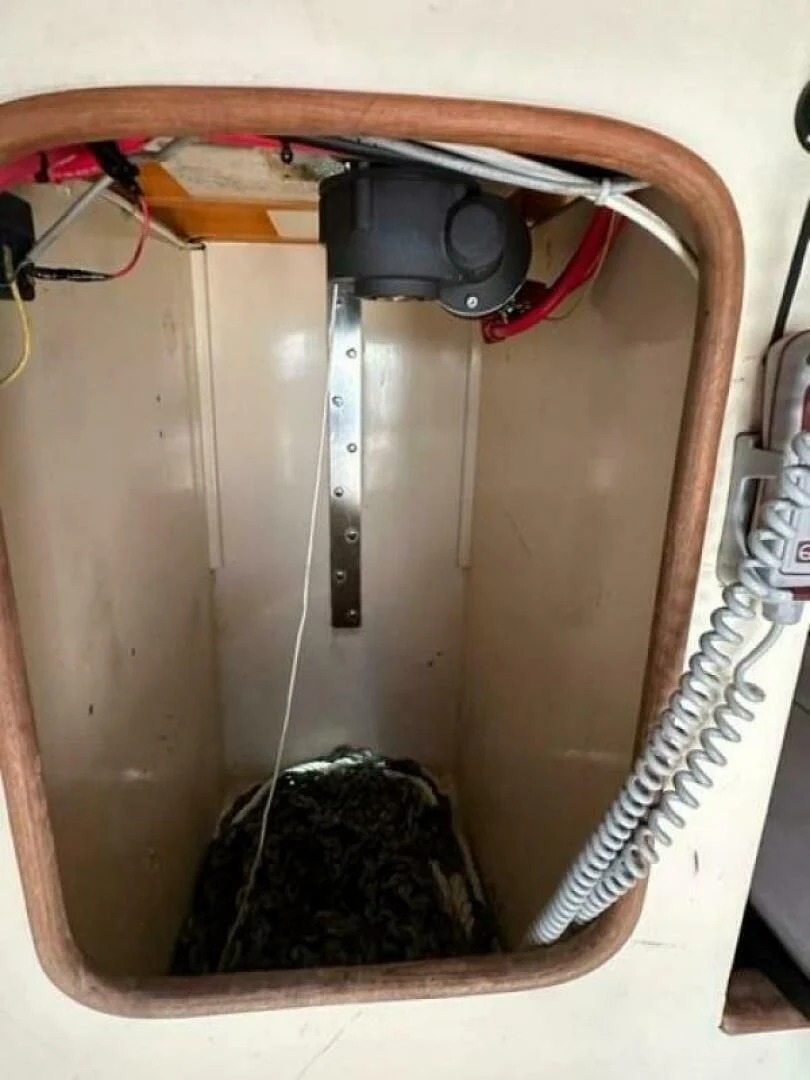 a cat under a shelf aboard WILD HORSES Yacht for Sale