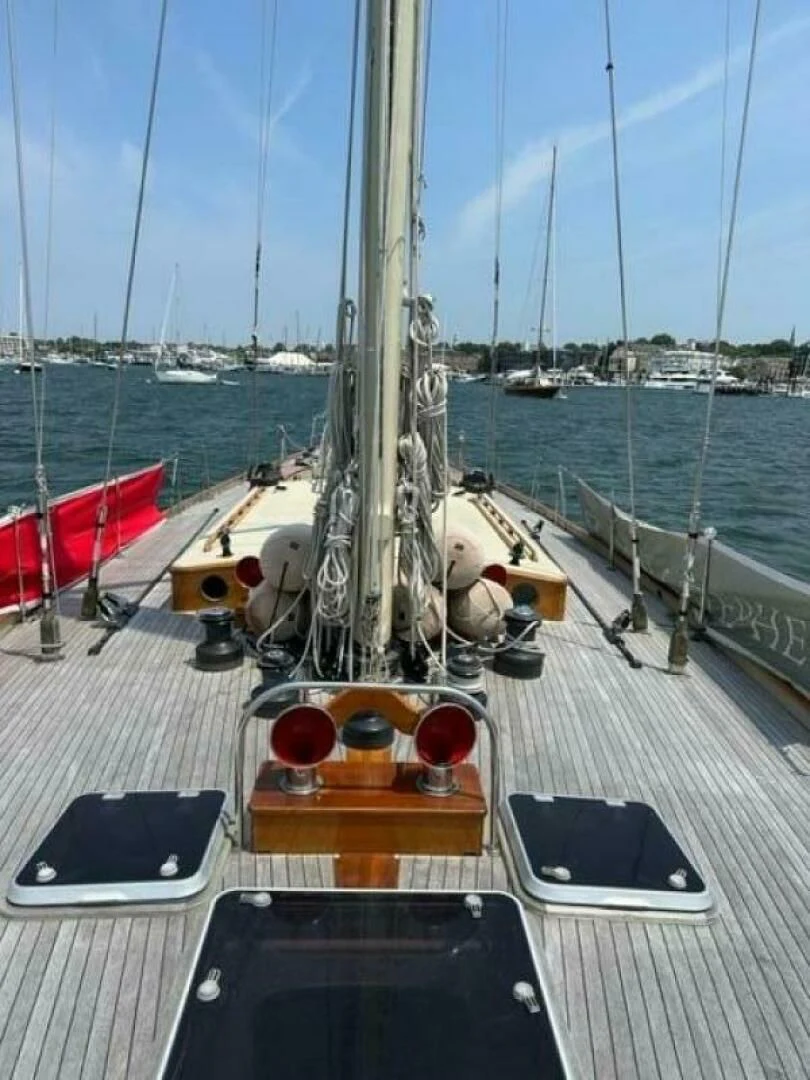 a sailboat on a deck aboard WILD HORSES Yacht for Sale
