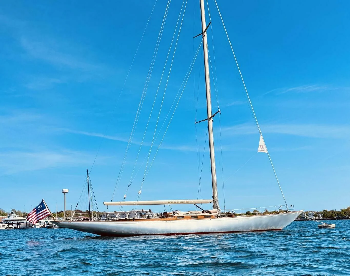 a sailboat on the water aboard WILD HORSES Yacht for Sale