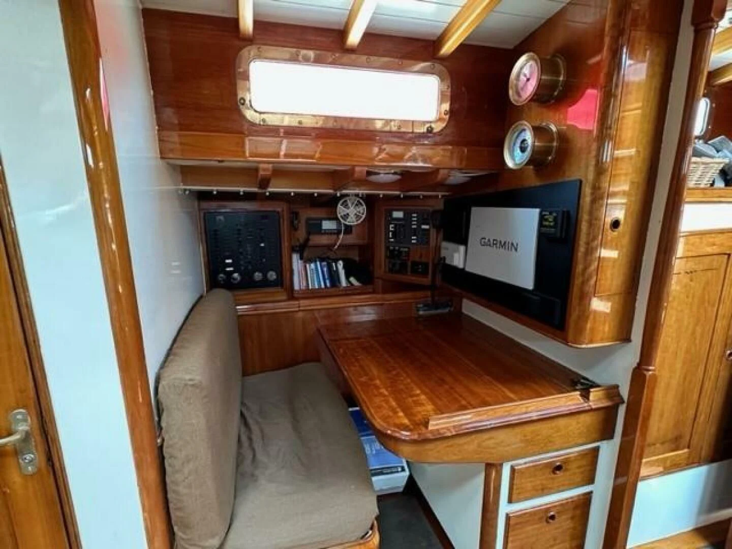 a living room with a couch and a tv aboard WILD HORSES Yacht for Sale