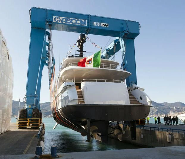 a large boat with a crane aboard UNICORN Yacht for Sale