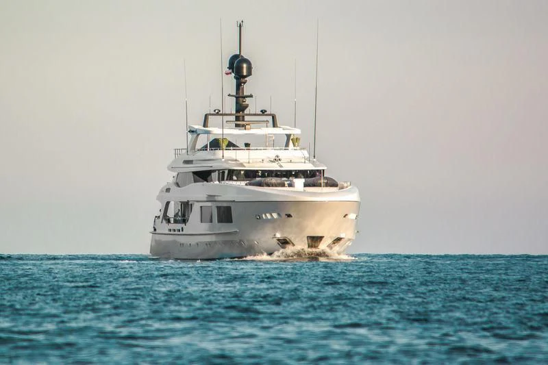 a white boat in the water aboard UNICORN Yacht for Sale