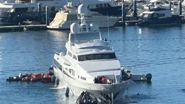 a large white boat in the water aboard TUMBERRY C Yacht for Sale