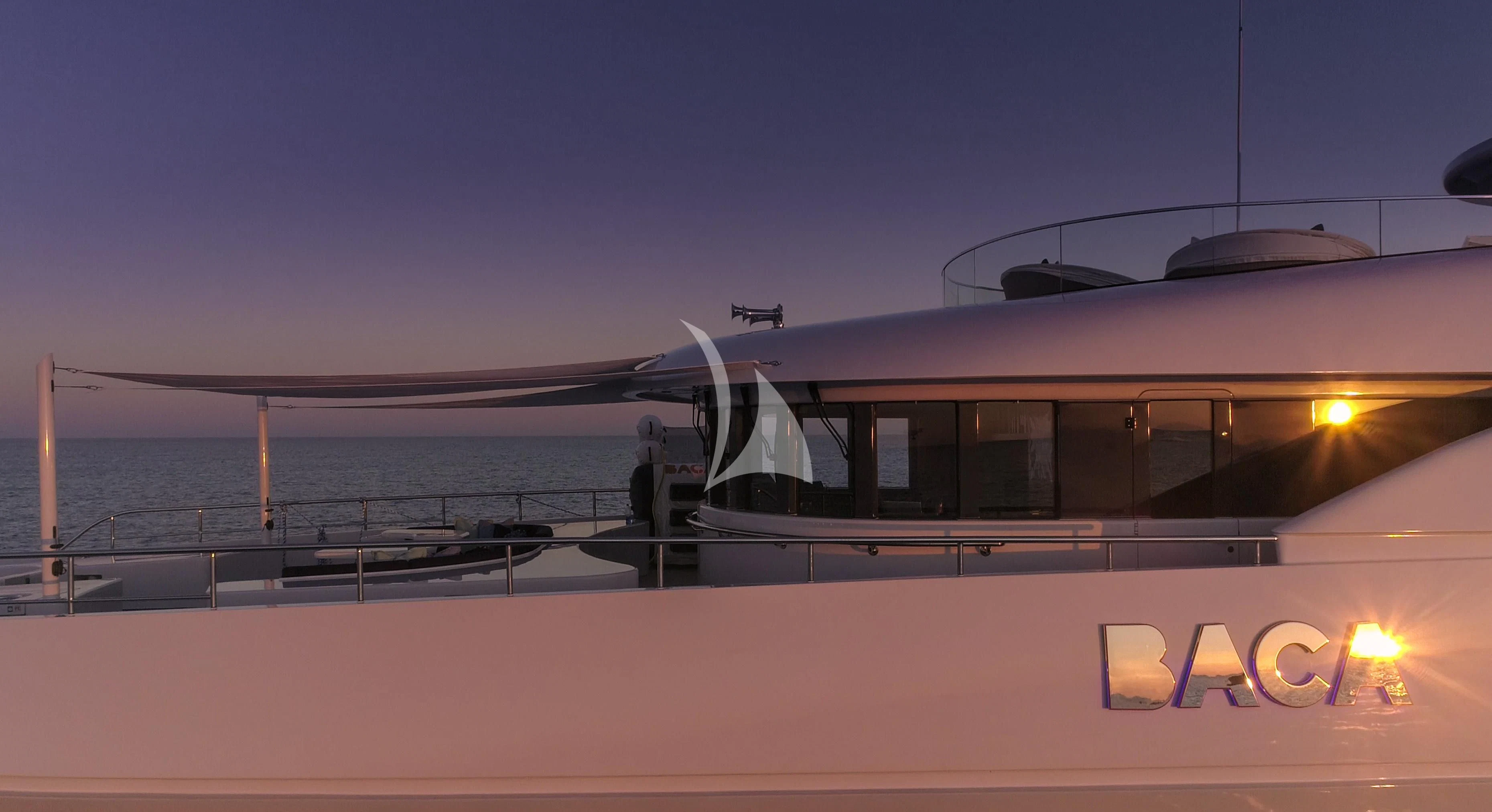 a boat on a dock aboard BACA Yacht for Charter
