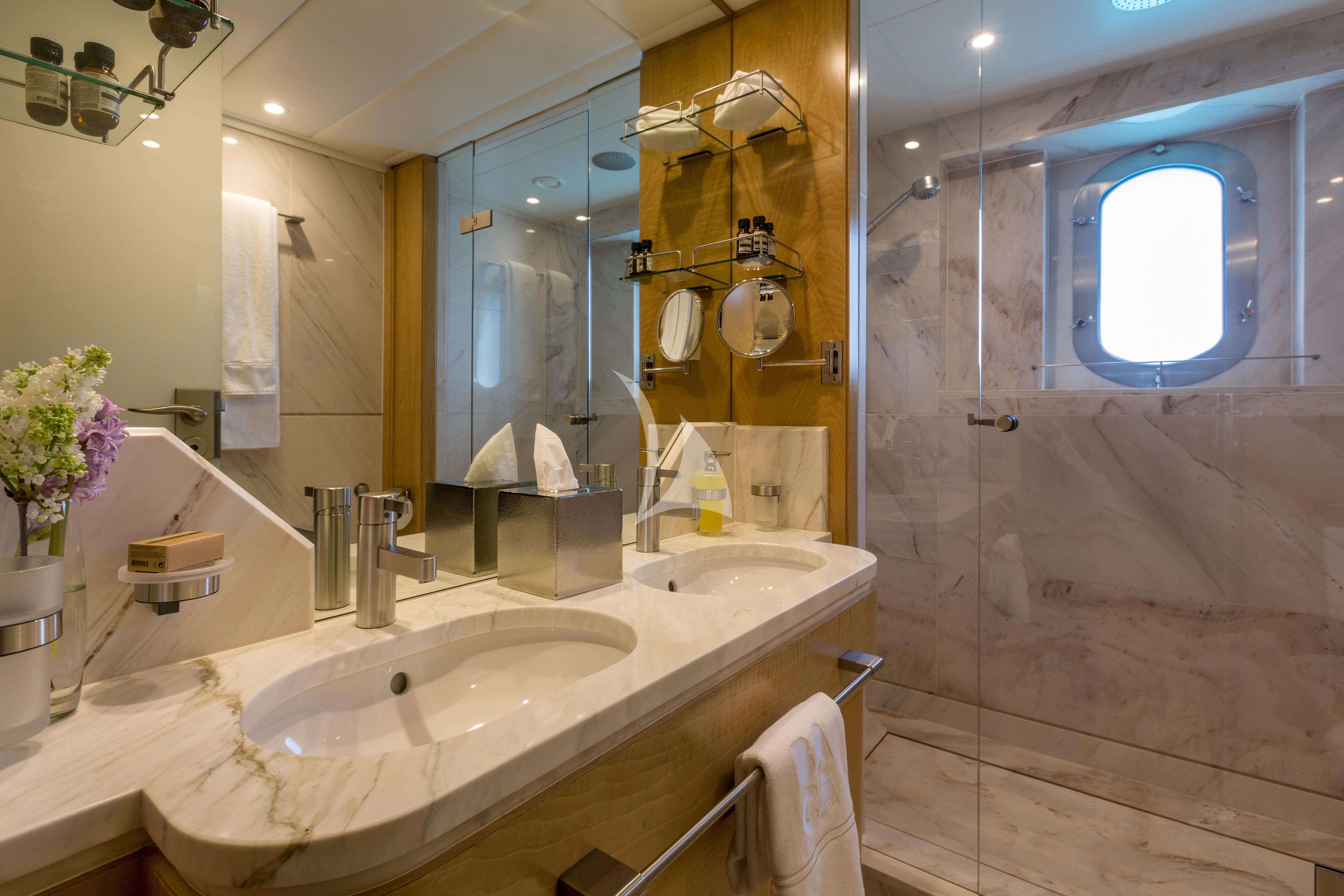 a bathroom with two sinks aboard BACA Yacht for Charter