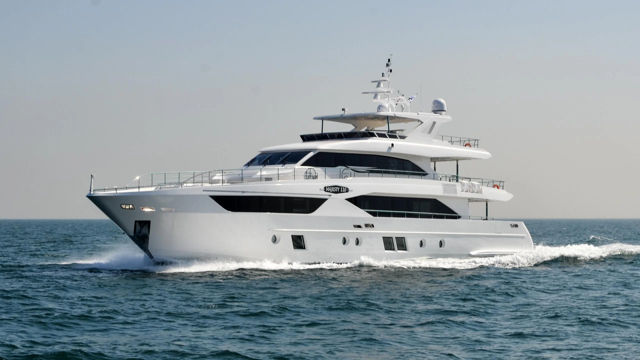 a white yacht on the water aboard AMORE Yacht for Sale