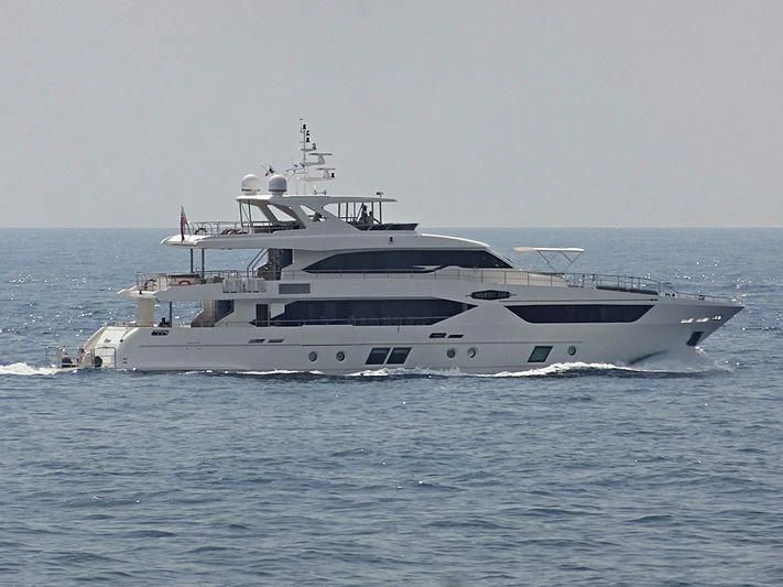 a large white boat in the water aboard AMORE Yacht for Sale