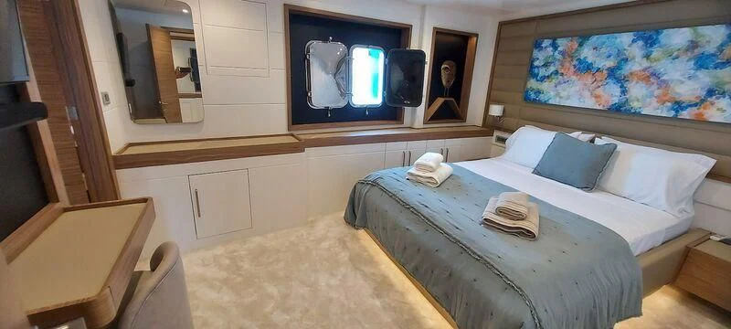 a bed in a room aboard DEEP WATER Yacht for Charter