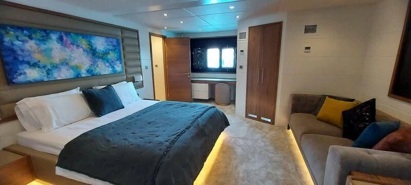 a large bed in a room aboard DEEP WATER Yacht for Charter