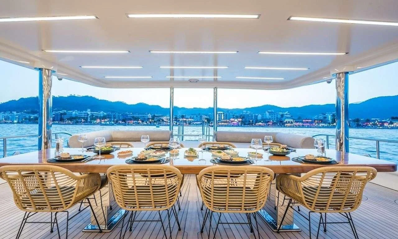 a table set for a meal aboard DEEP WATER Yacht for Charter