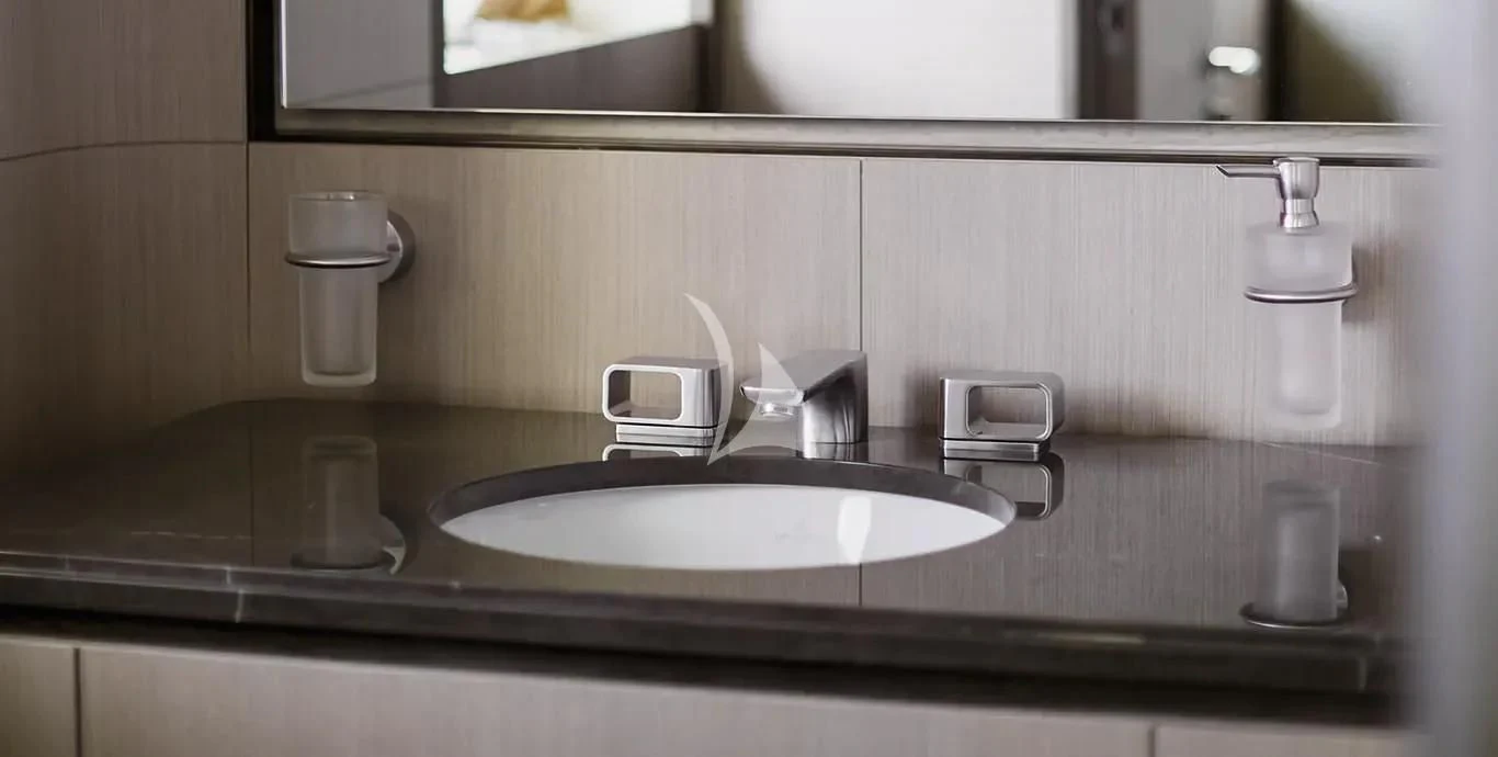 a sink with a faucet aboard CASA Yacht for Sale