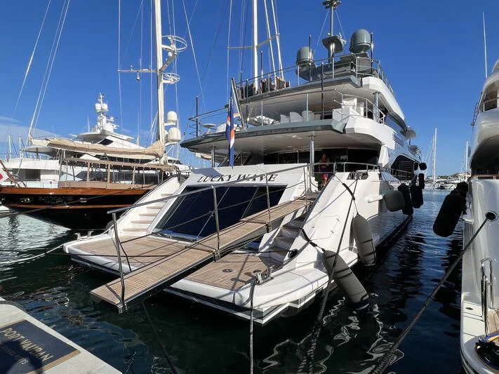 a boat docked at a pier aboard CASA Yacht for Sale