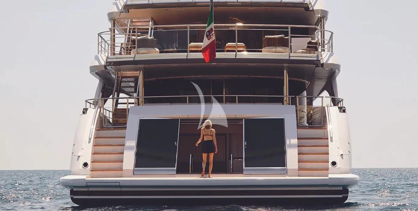 a person standing on a boat aboard CASA Yacht for Sale