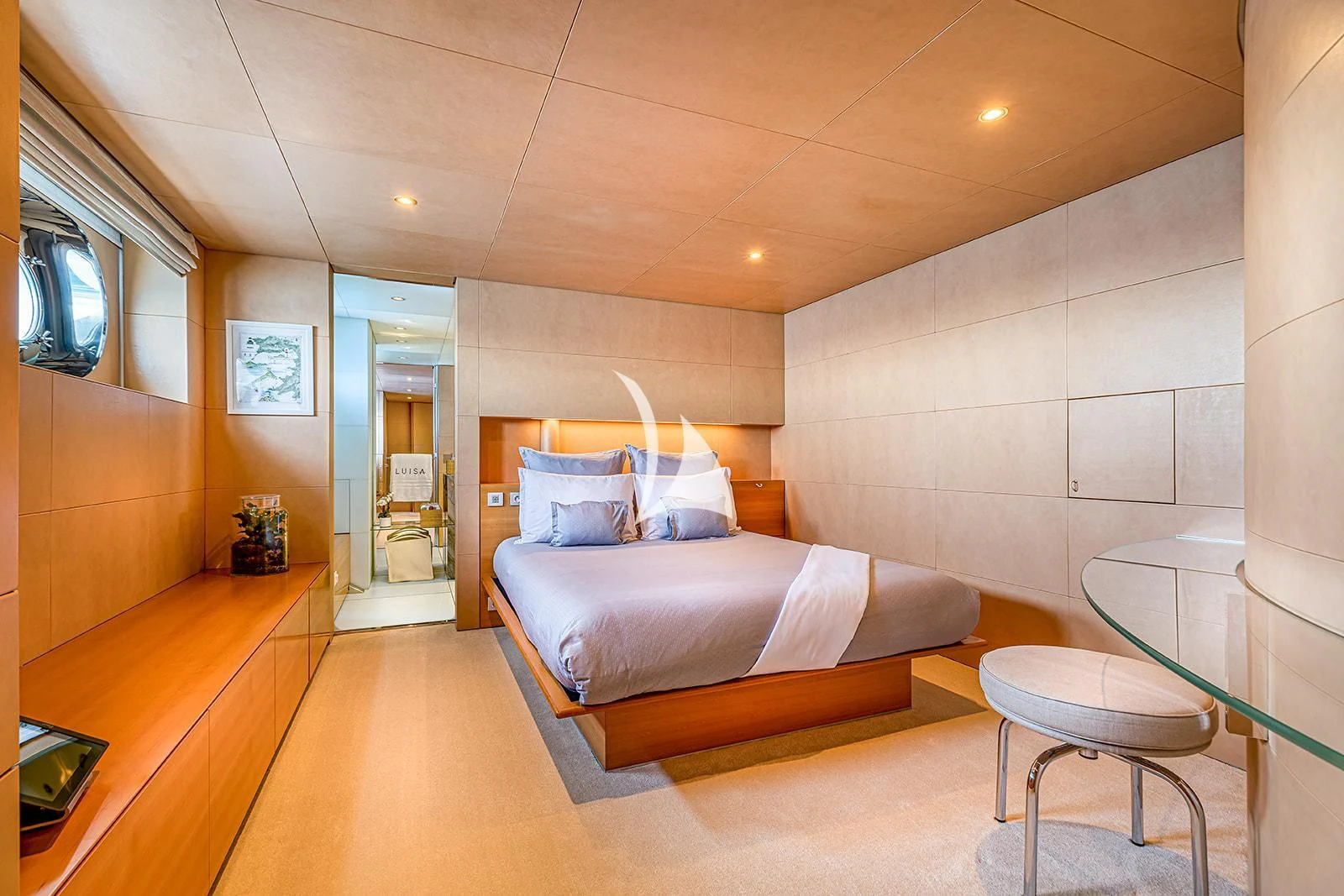 a bed in a room aboard LUISA Yacht for Charter