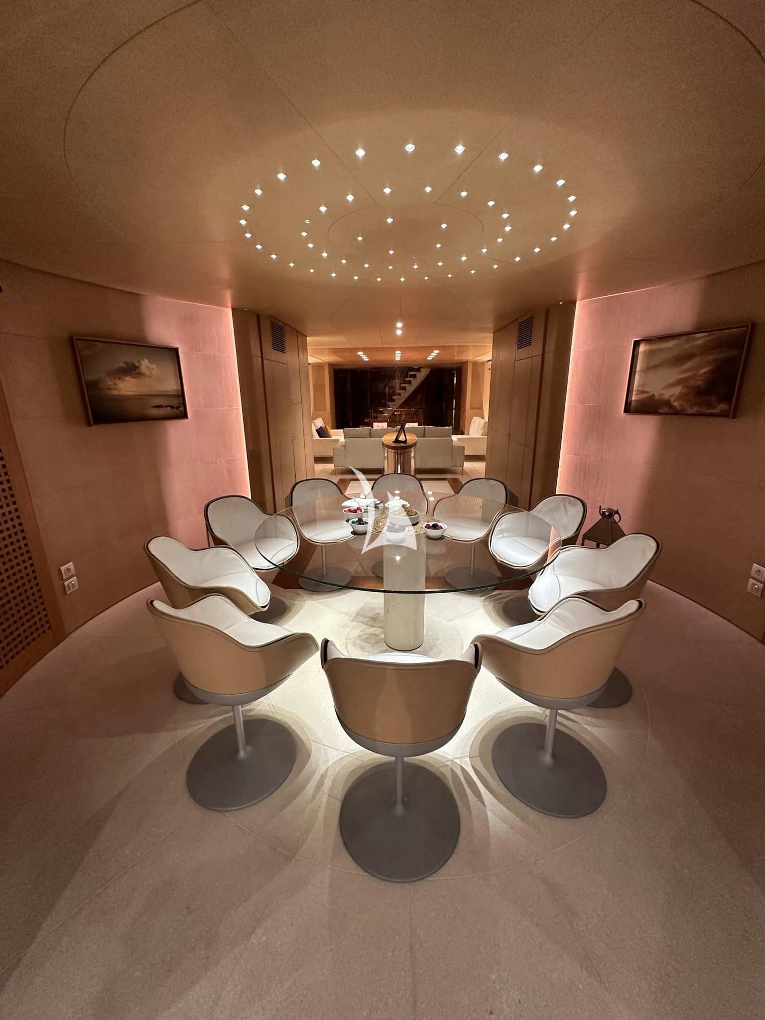 a room with a table and chairs aboard LUISA Yacht for Charter
