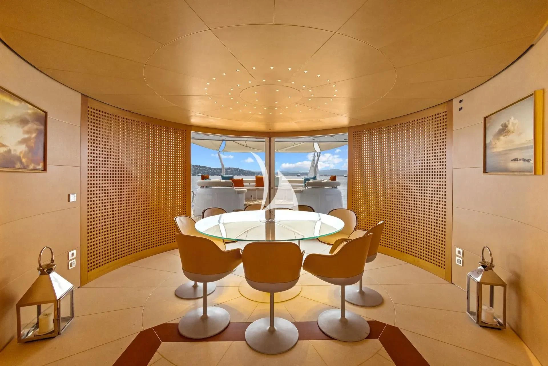 a room with a table and chairs aboard LUISA Yacht for Charter