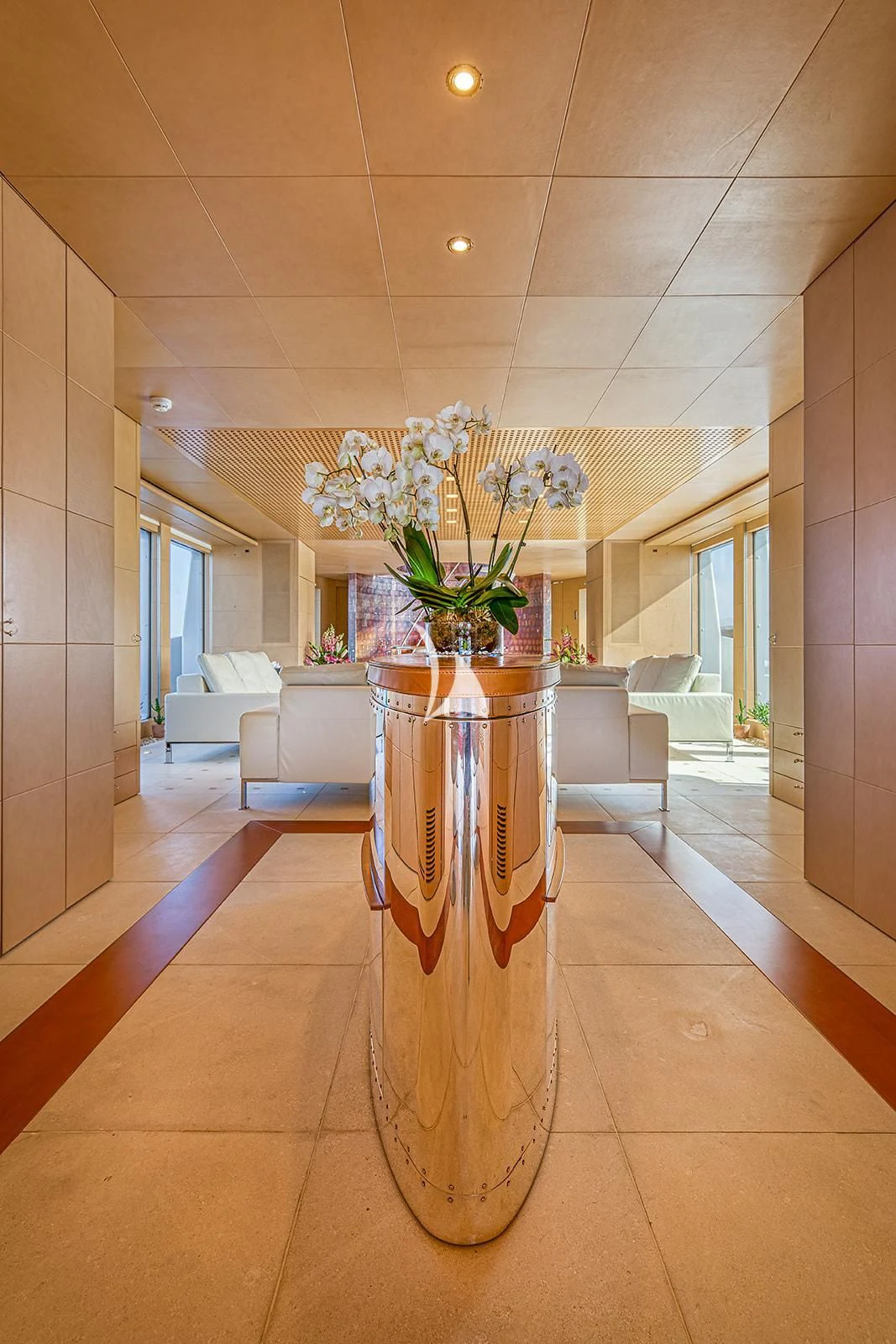 a vase of flowers on a table aboard LUISA Yacht for Charter