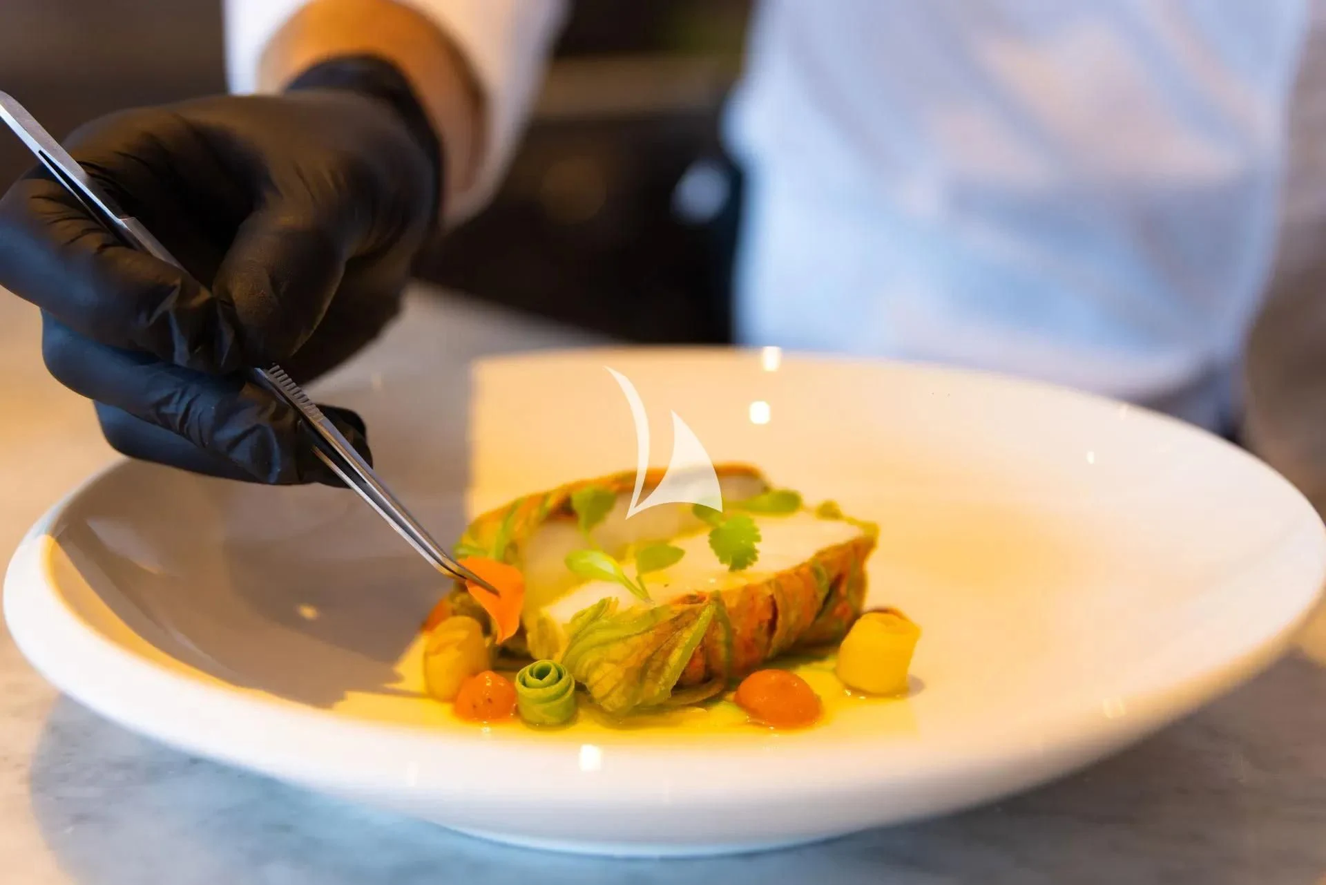 a plate of food aboard LUISA Yacht for Charter