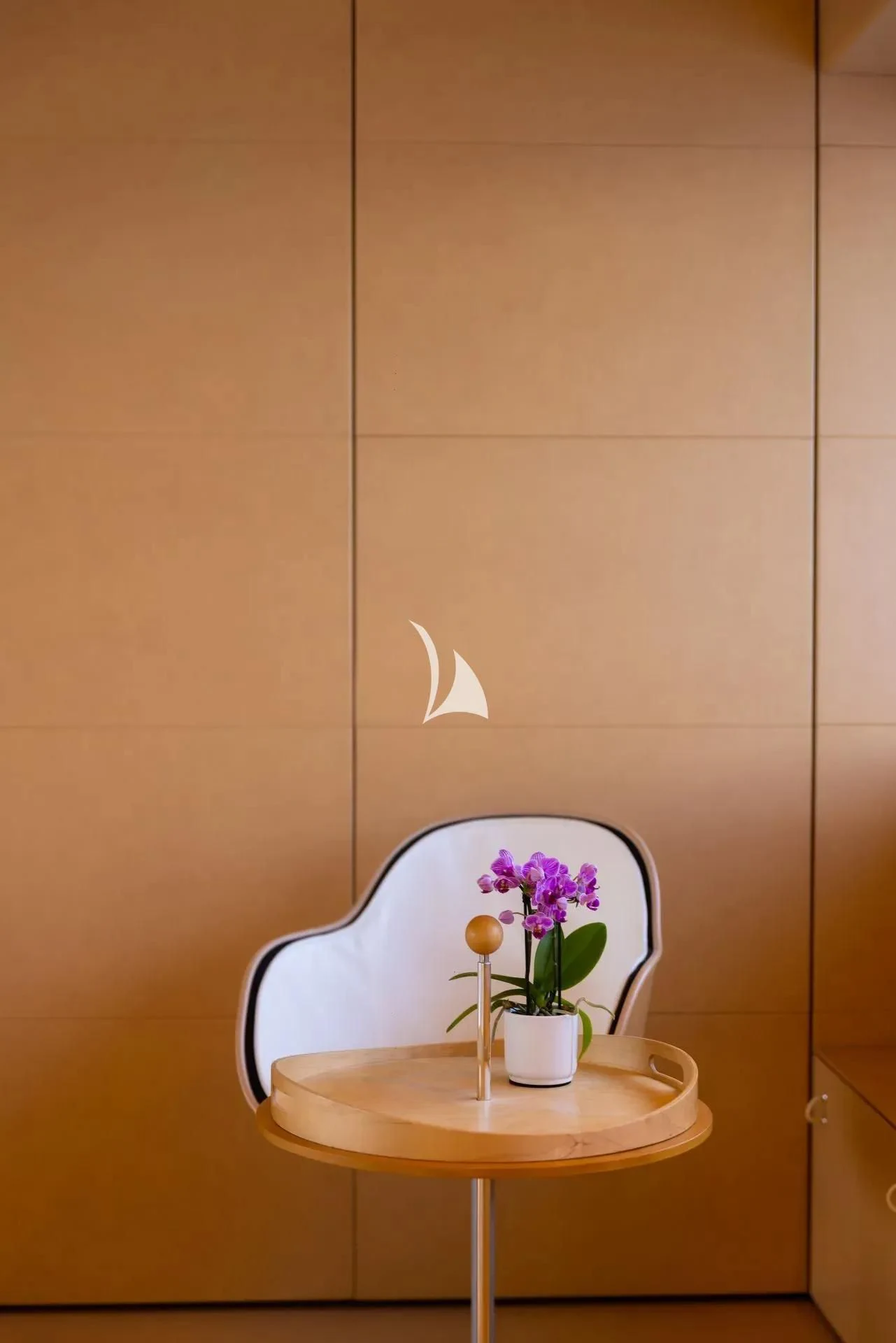 a white chair with a flower on it aboard LUISA Yacht for Charter