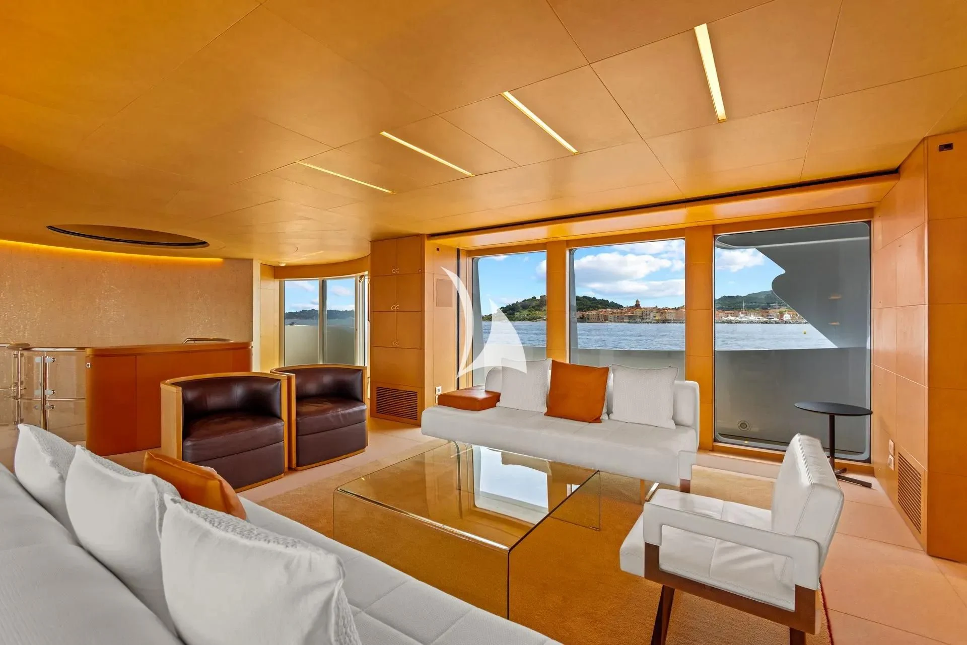 a living room with a large window aboard LUISA Yacht for Charter