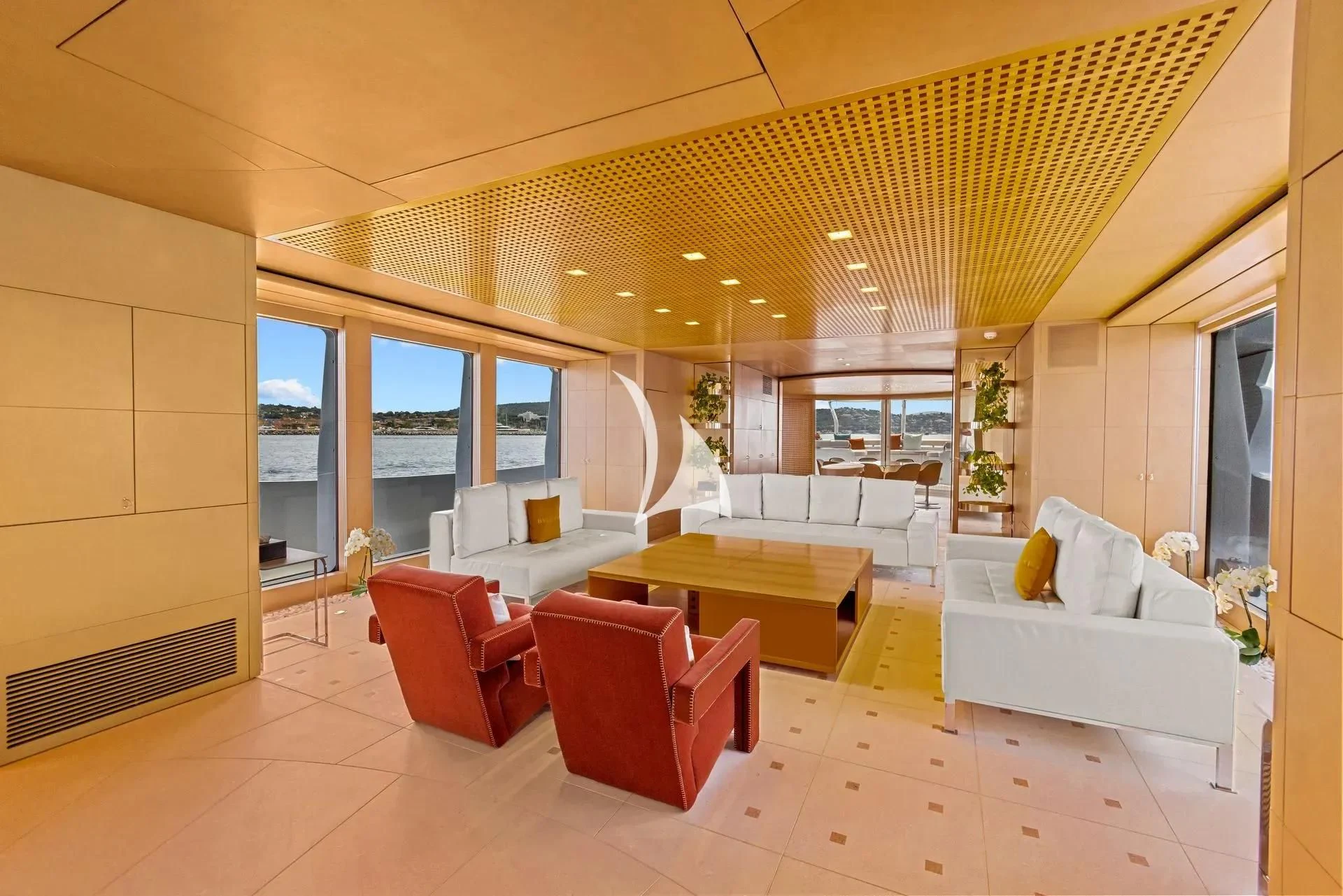 a living room with a table and chairs aboard LUISA Yacht for Charter