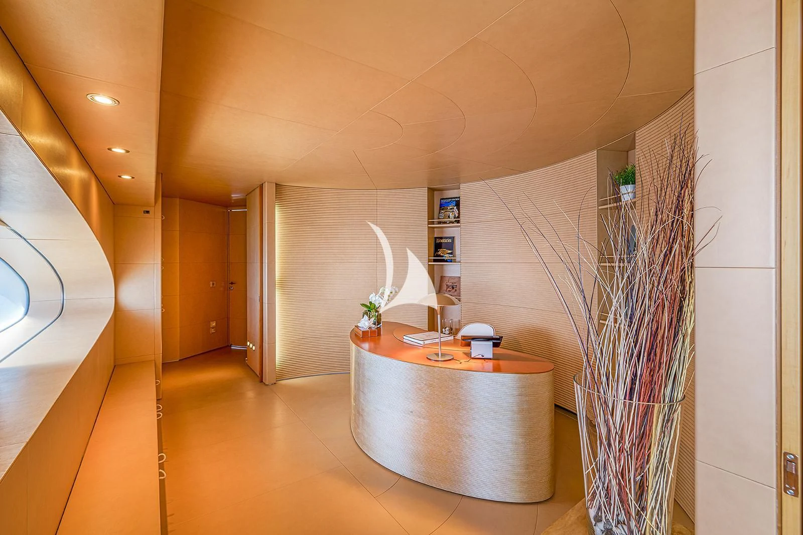 a room with a table and a plant in it aboard LUISA Yacht for Charter