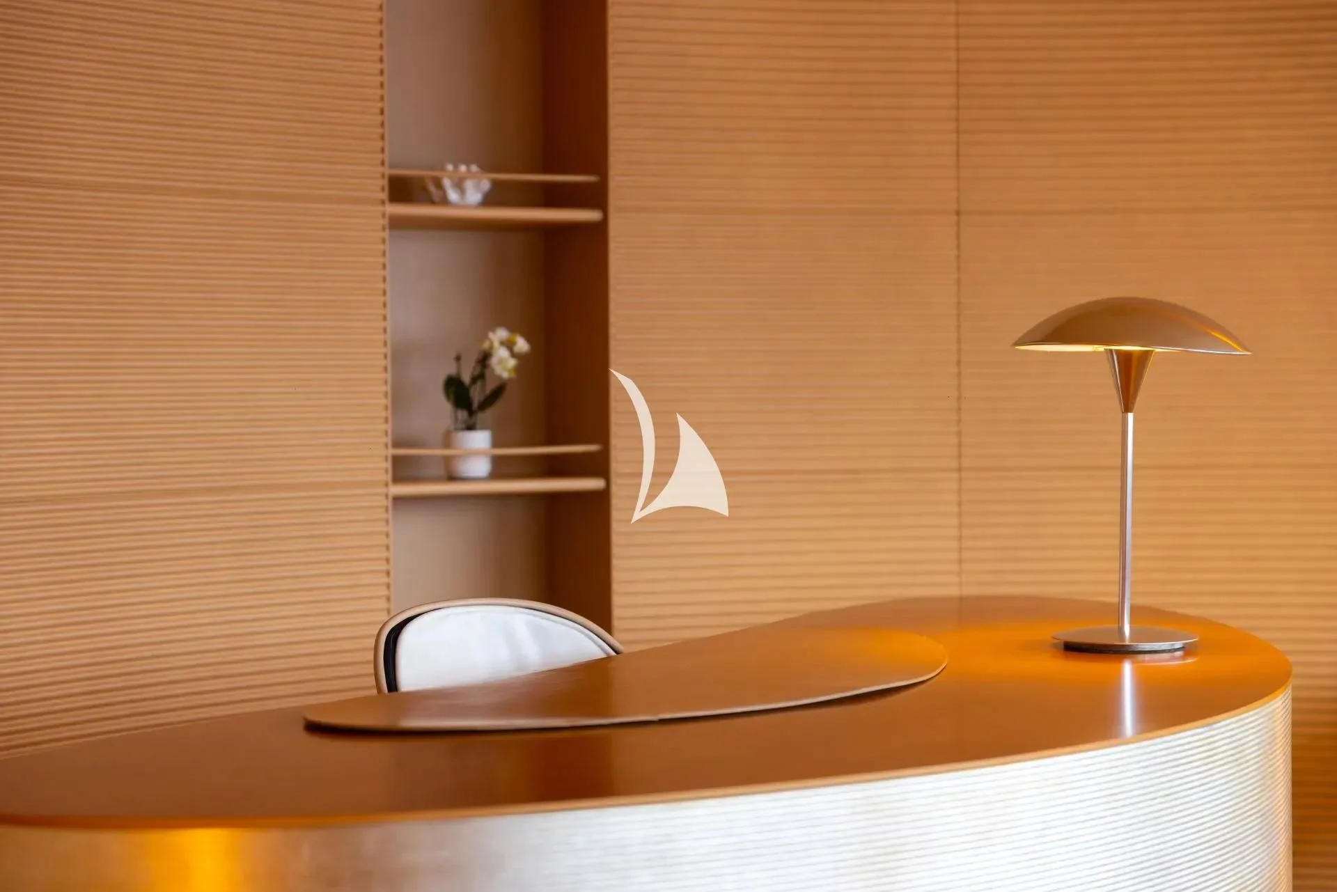 a lamp on a table aboard LUISA Yacht for Charter