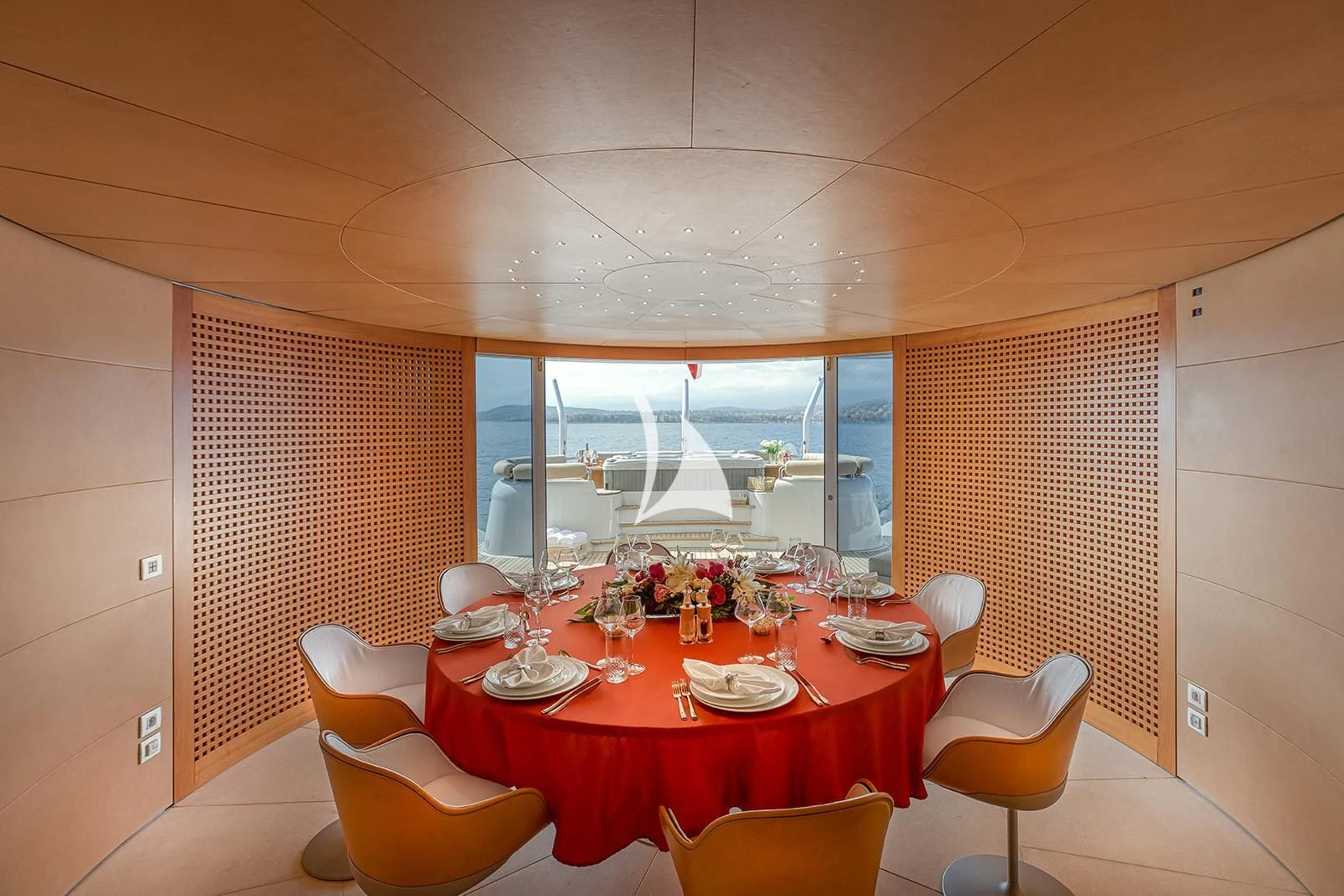 a dining table set for a dinner aboard LUISA Yacht for Charter
