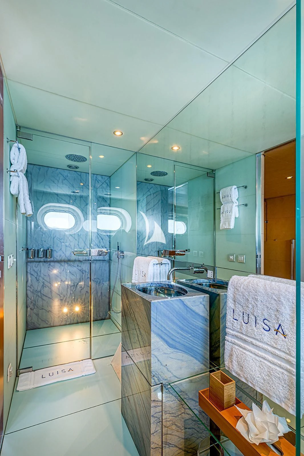 a bathroom with a large mirror aboard LUISA Yacht for Charter