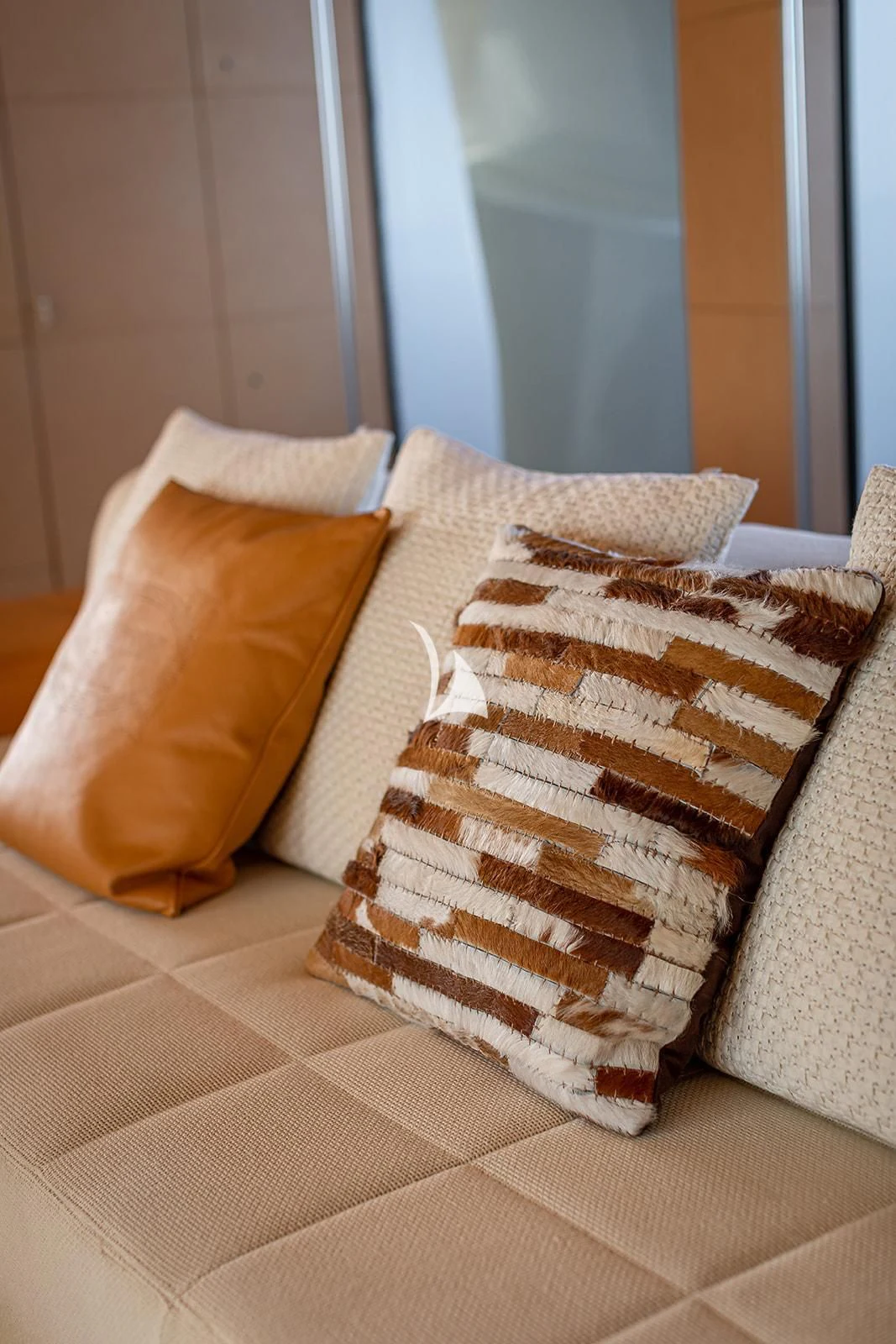 a stack of pillows aboard LUISA Yacht for Charter