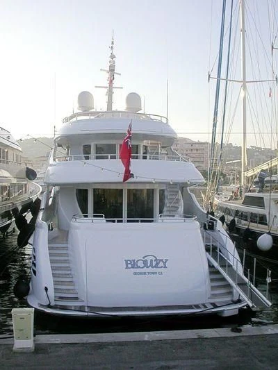 a boat in a harbor aboard LUISA Yacht for Charter
