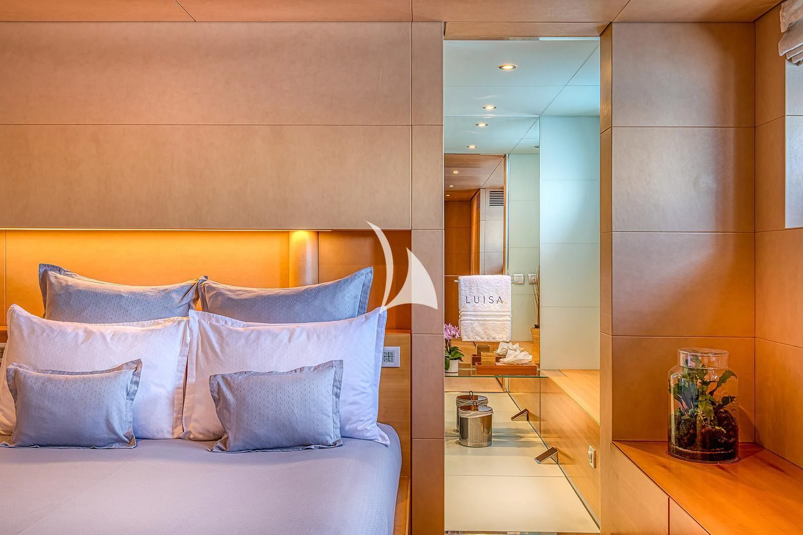 a bed in a room aboard LUISA Yacht for Charter