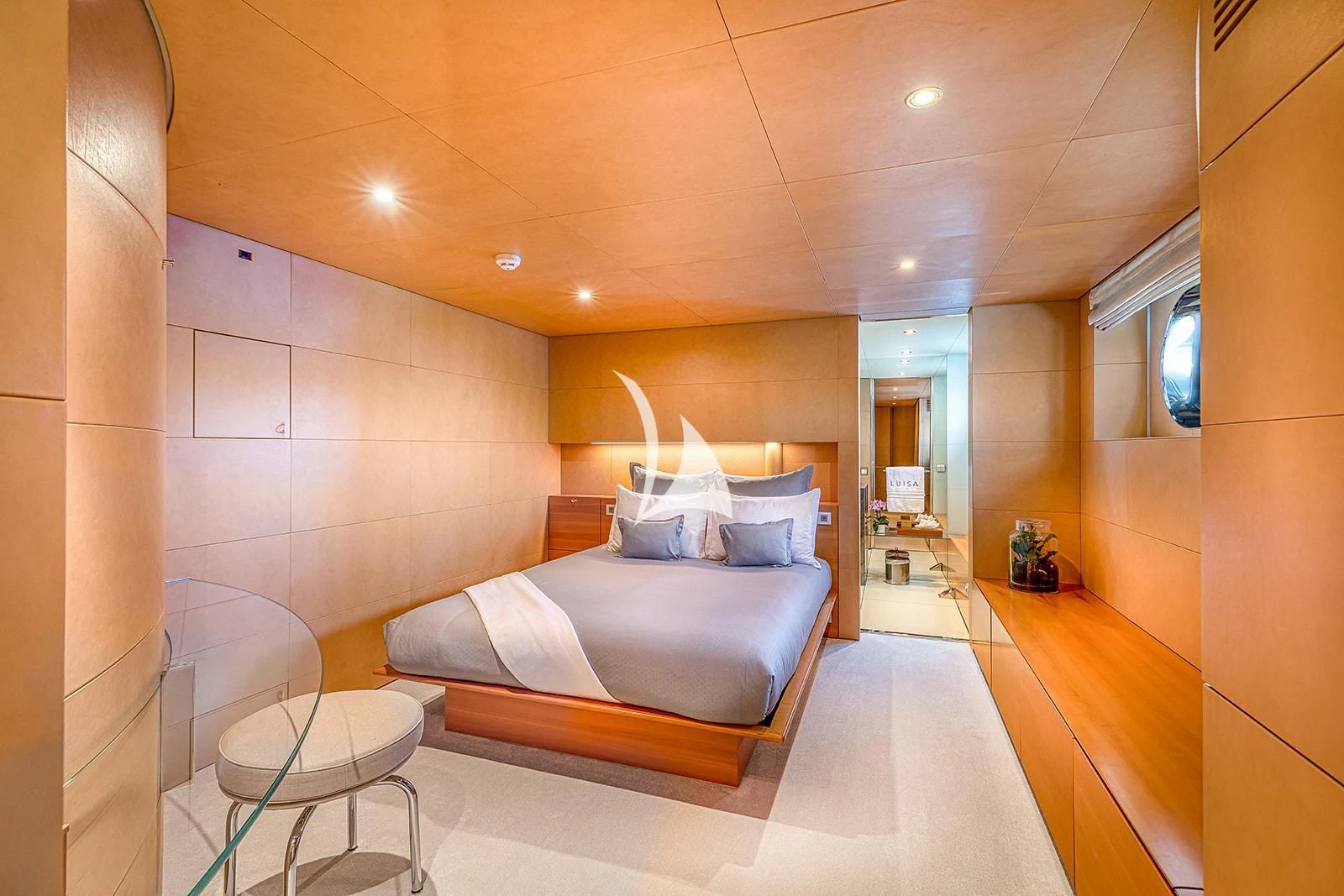 a bed in a room aboard LUISA Yacht for Charter
