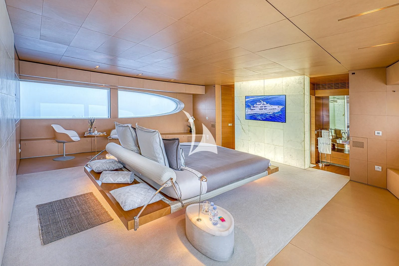 a living room with a couch and a table aboard LUISA Yacht for Charter