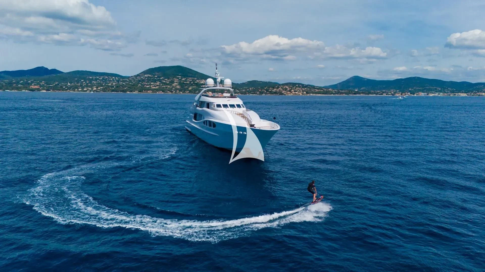 a person surfing on the sea aboard LUISA Yacht for Charter