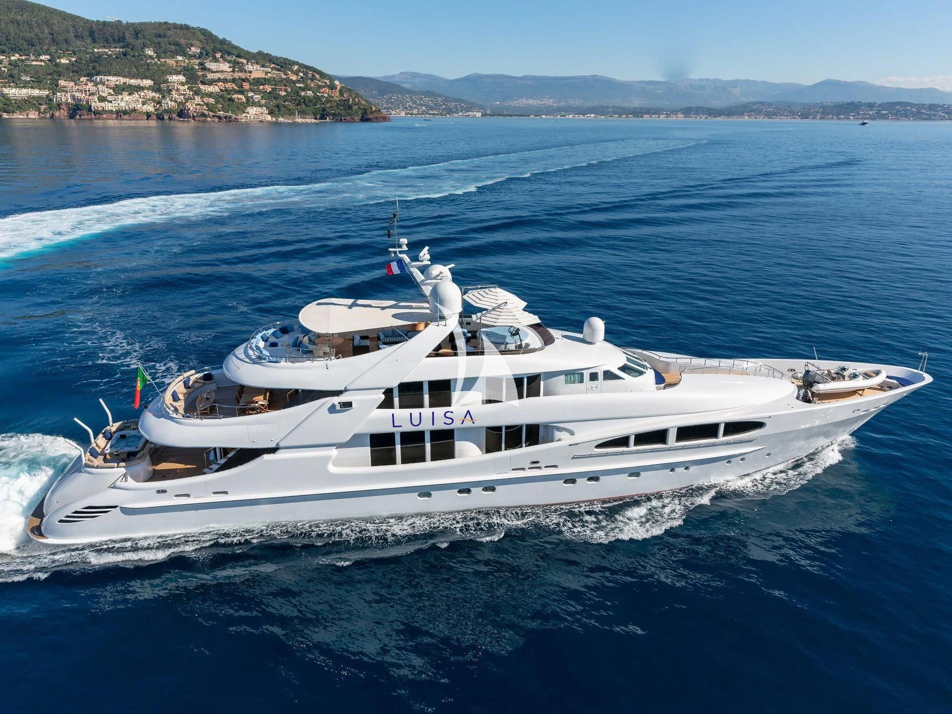 a white yacht on the water aboard LUISA Yacht for Charter