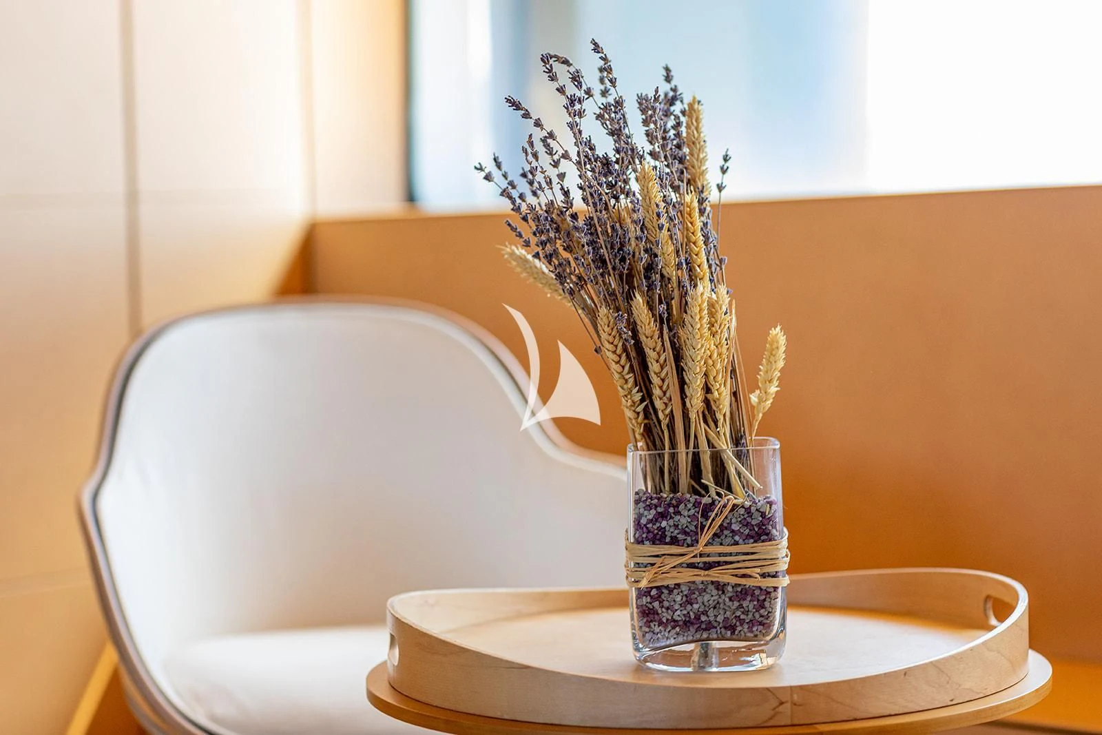a glass of water on a table aboard LUISA Yacht for Charter