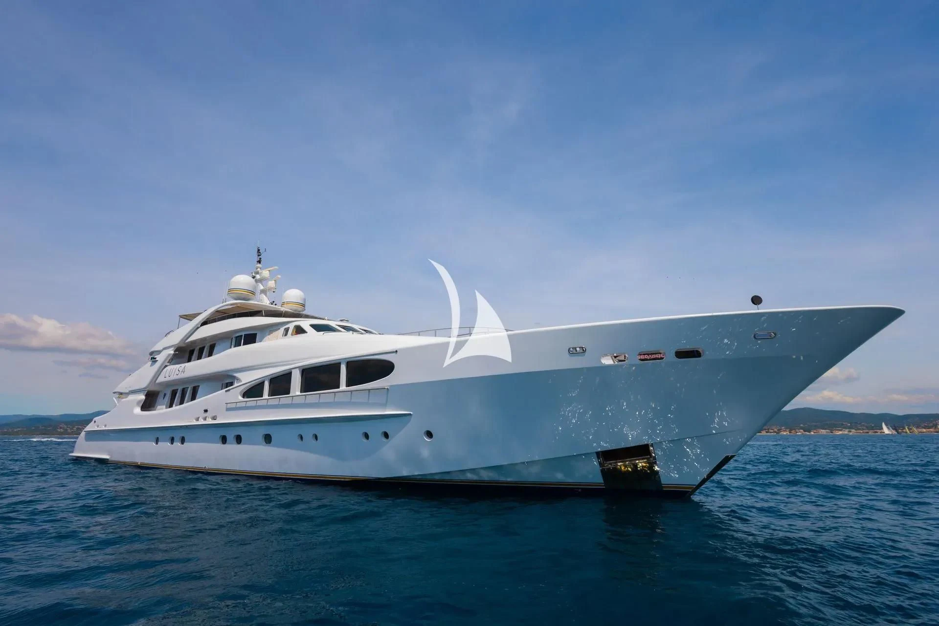 a white yacht in the water aboard LUISA Yacht for Charter