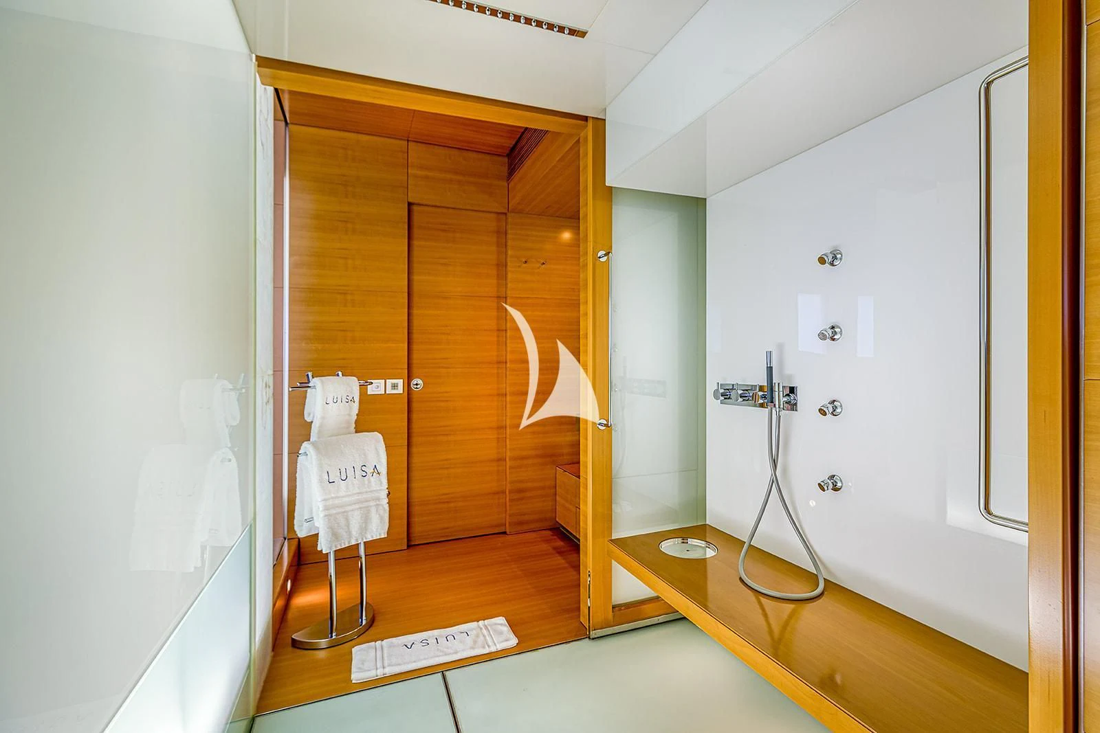 a room with a shower and a sink aboard LUISA Yacht for Charter