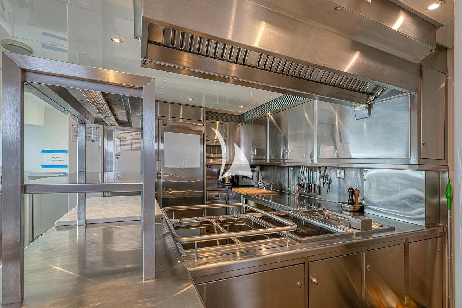 a large kitchen with stainless steel appliances aboard LUISA Yacht for Charter