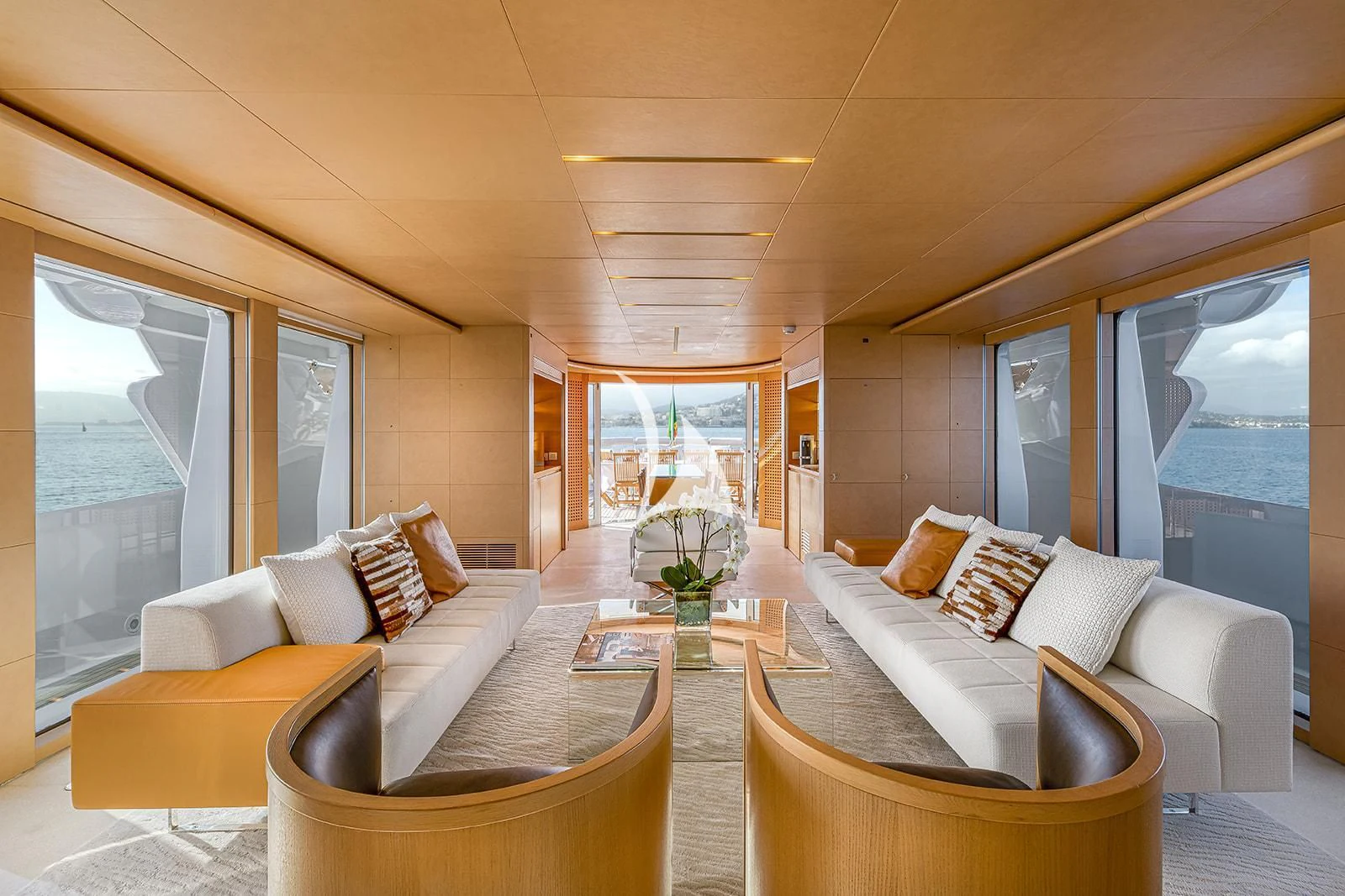 a living room with a large window aboard LUISA Yacht for Charter