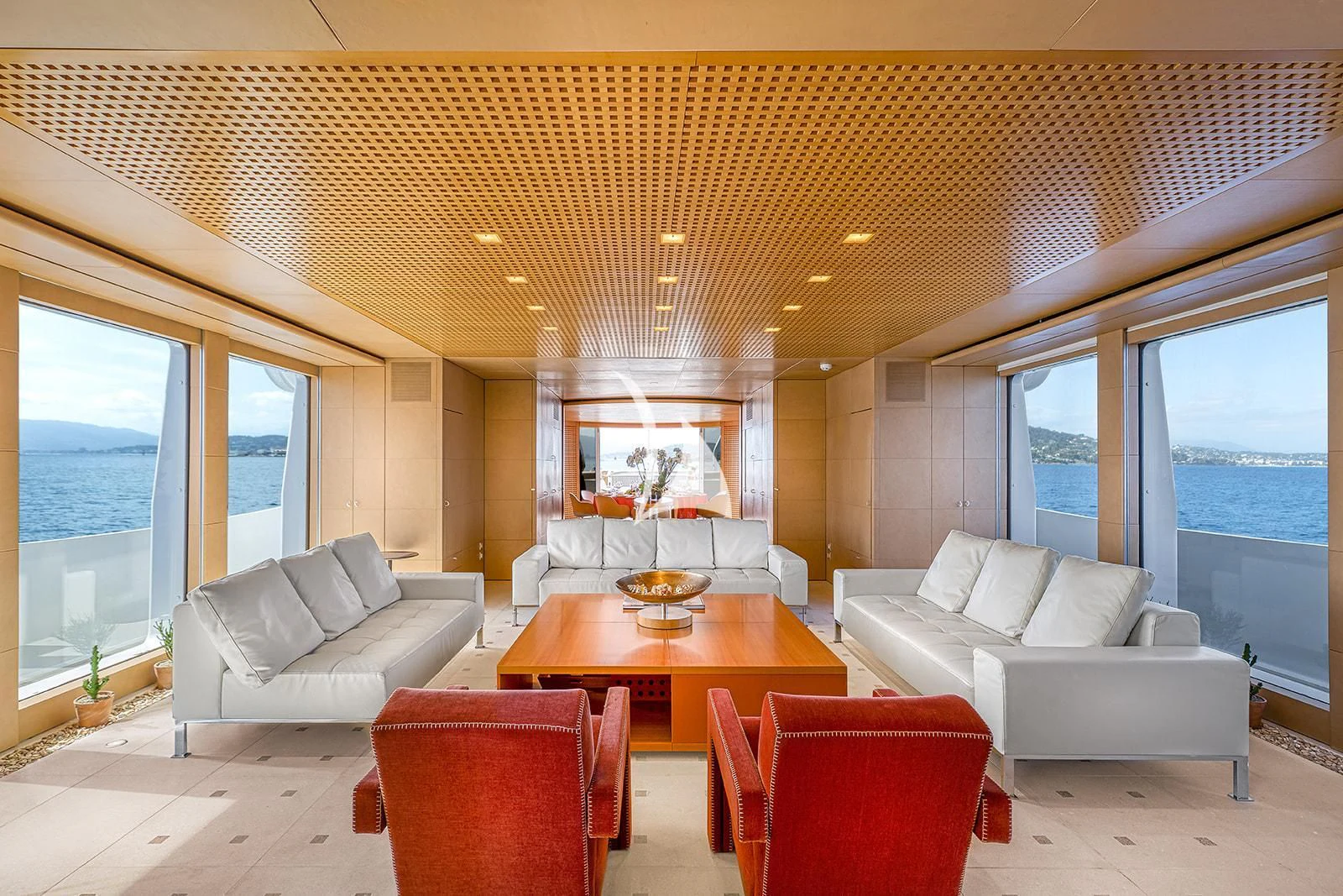 a living room with a table and chairs aboard LUISA Yacht for Charter