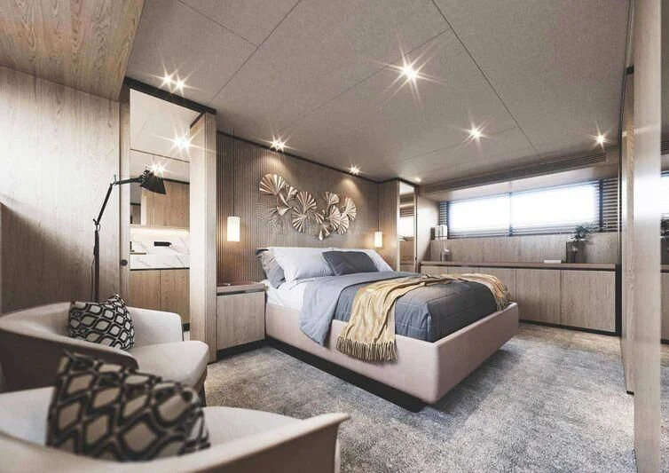 a bedroom with a bed and a lamp aboard TERRANOVA TM90/01 Yacht for Sale