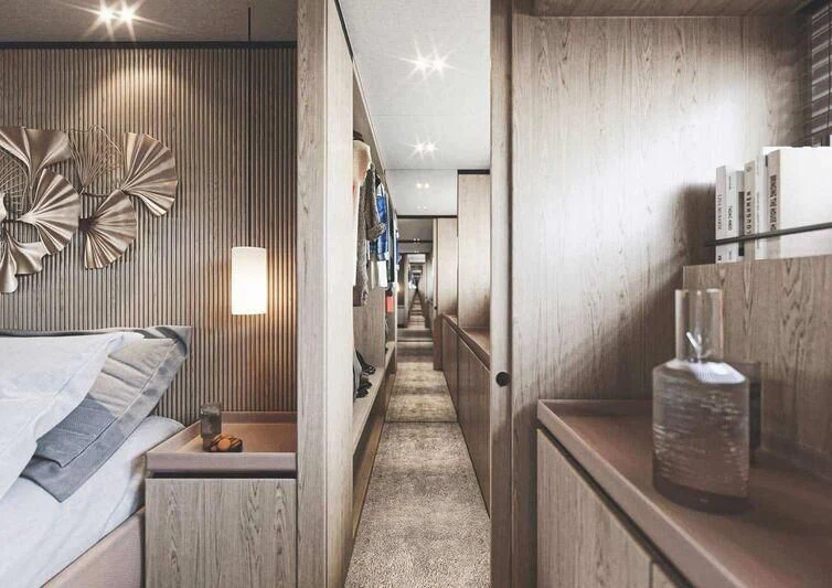 a room with a bed and a table aboard TERRANOVA TM90/01 Yacht for Sale
