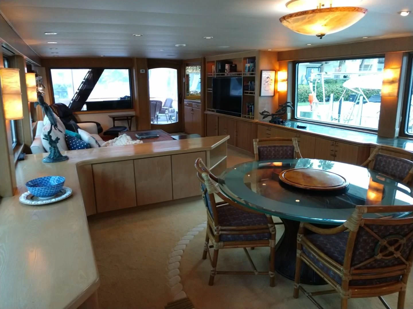 a group of people in a living room aboard CAROLE TOO Yacht for Sale