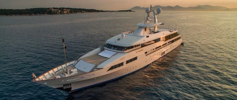 a large white boat in the water aboard LE PHARAON Yacht for Sale