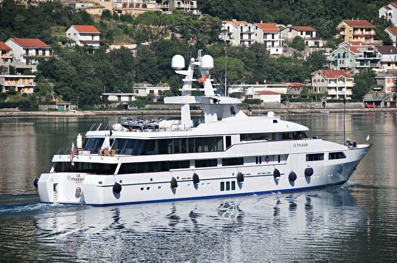 a white boat on water aboard LE PHARAON Yacht for Sale