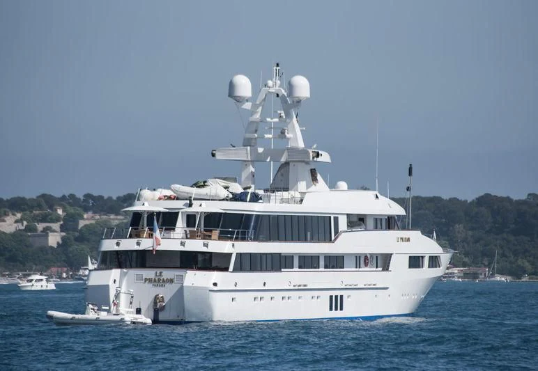 a large white boat in the water aboard LE PHARAON Yacht for Sale