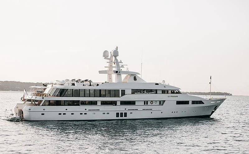 a large white boat in the water aboard LE PHARAON Yacht for Sale