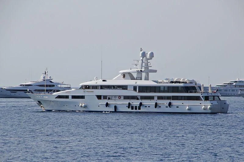 a large white boat in the water aboard LE PHARAON Yacht for Sale